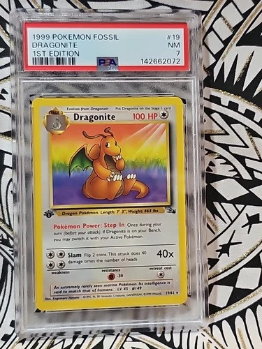 DRAGONITE 1999 POKEMEN FOSSIL 1ST ED. RARE NON HOLO #19 PSA  7 NEAR MINT (072)