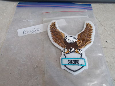 NOS Suzuki Motorcycle Patch Eagle Wings Spread Holding Logo