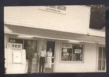 REAL PHOTO ELM SPRINGS ARKANSAS GROCERY STORE FIREWORKS SIGN POSTCARD COPY