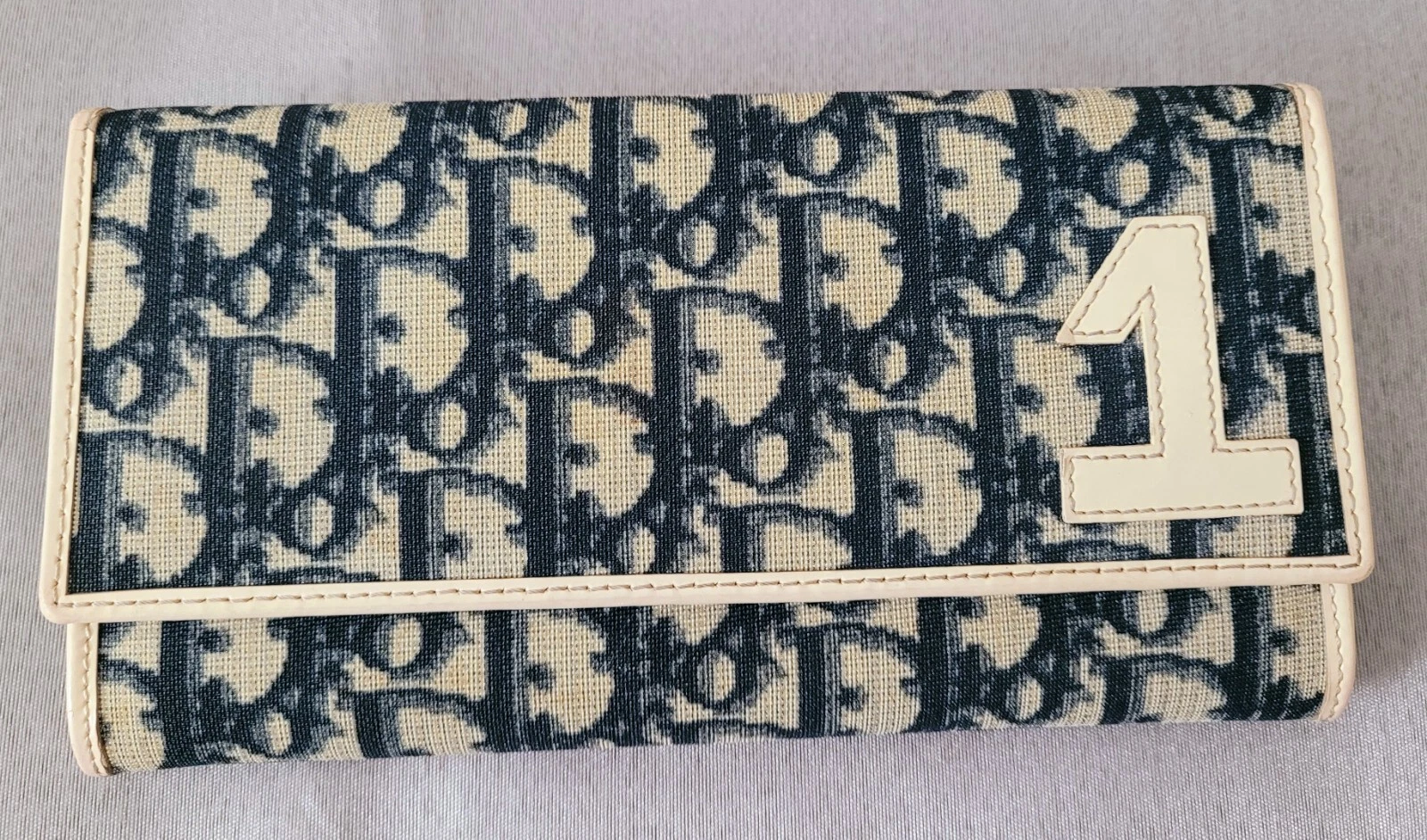 PORTEFEUILLE LONG AUTHENTIQUE CHRISTIAN DIOR VINTAGE BI PLI CUIR ET PVC OCCASION BLEU MARINE