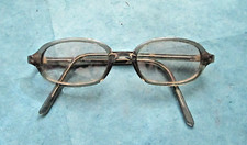 Vintage 1990's clear gray tiny oval sunglass frames by Jones New York