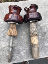 2 Vintage Locke Brown Porcelain Insulators With Wooden Posts