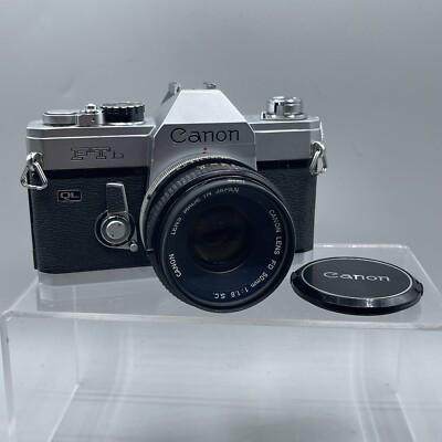 Chrome Canon FTb-QL 35mm SLR Camera 50mm f/1.8 FD Lens, And Hoya UV Filter Lense
