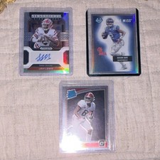 Lot of 3 Cards - Jaxson Dart, Levi Lewis, and Devonta Smith