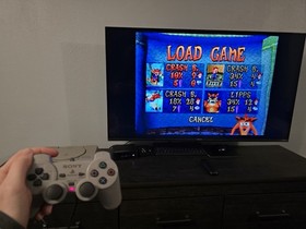 Sony PlayStation 1 System With 5 Controllers, 1 Memory Card, 1 Game, Ganeshark