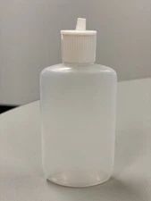 Silgan 2oz plastic bottles with flip cap. 4000 pcs