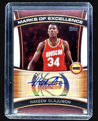 Hakeem Olajuwon – 2025-26 Topps Basketball · Marks of Excellence #ME-HO Hakeem Olajuwon