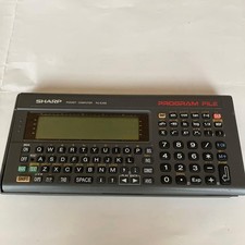 SHARP PC-E200 Pocket Computer Vintage Retro Gadget Collectible Untested
