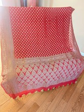 Beautiful Khaddi Georgette saree with intricate zari weave all over the body.