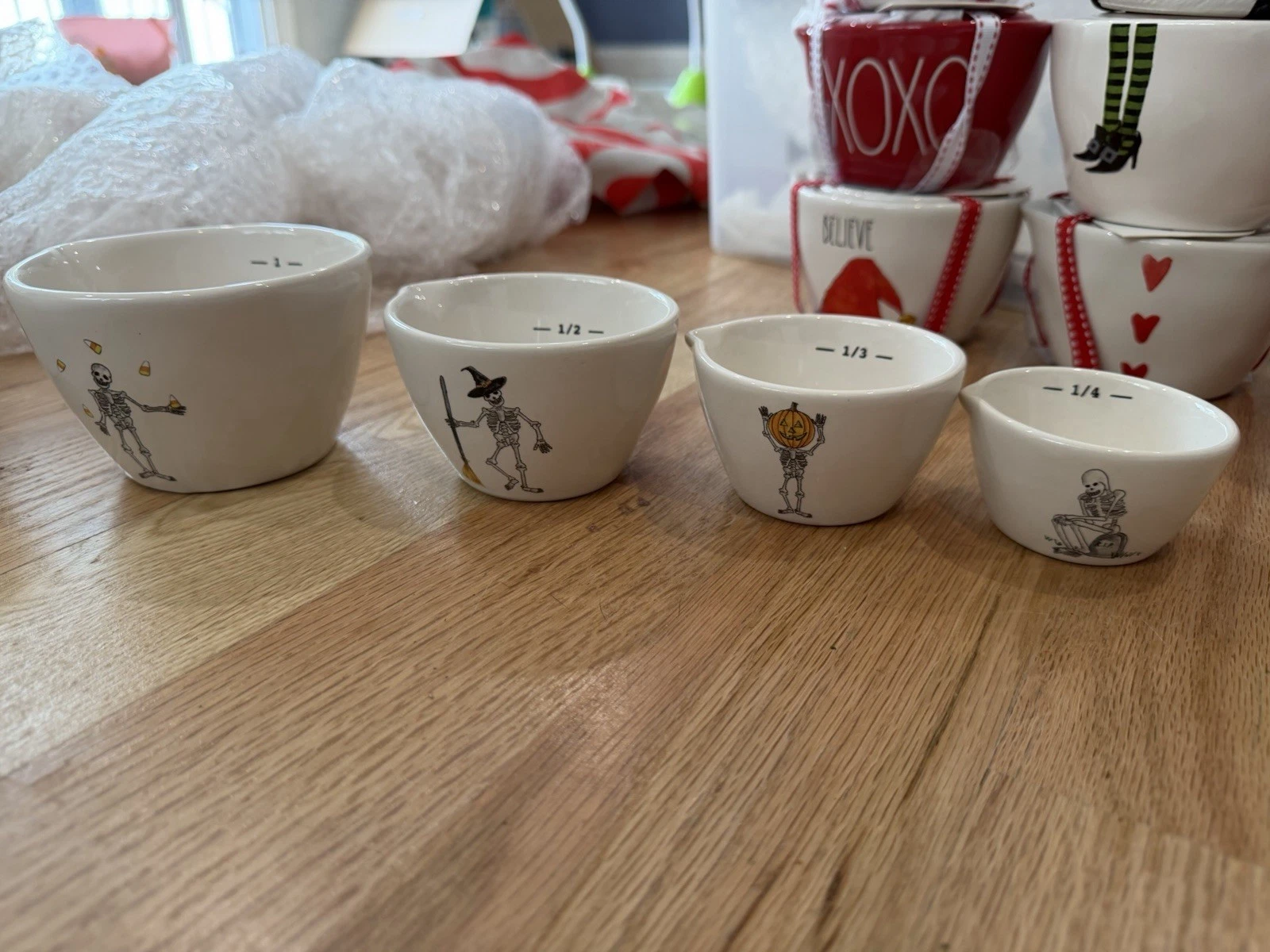 RARE NEW HTF Rae Dunn Ceramic Dancing Skeleton Measuring Cup Set of 4