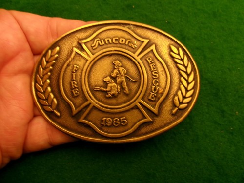 Fire rescue Suncor 1985 brass belt buckle 3.75" x 2.5" Canadian oil company