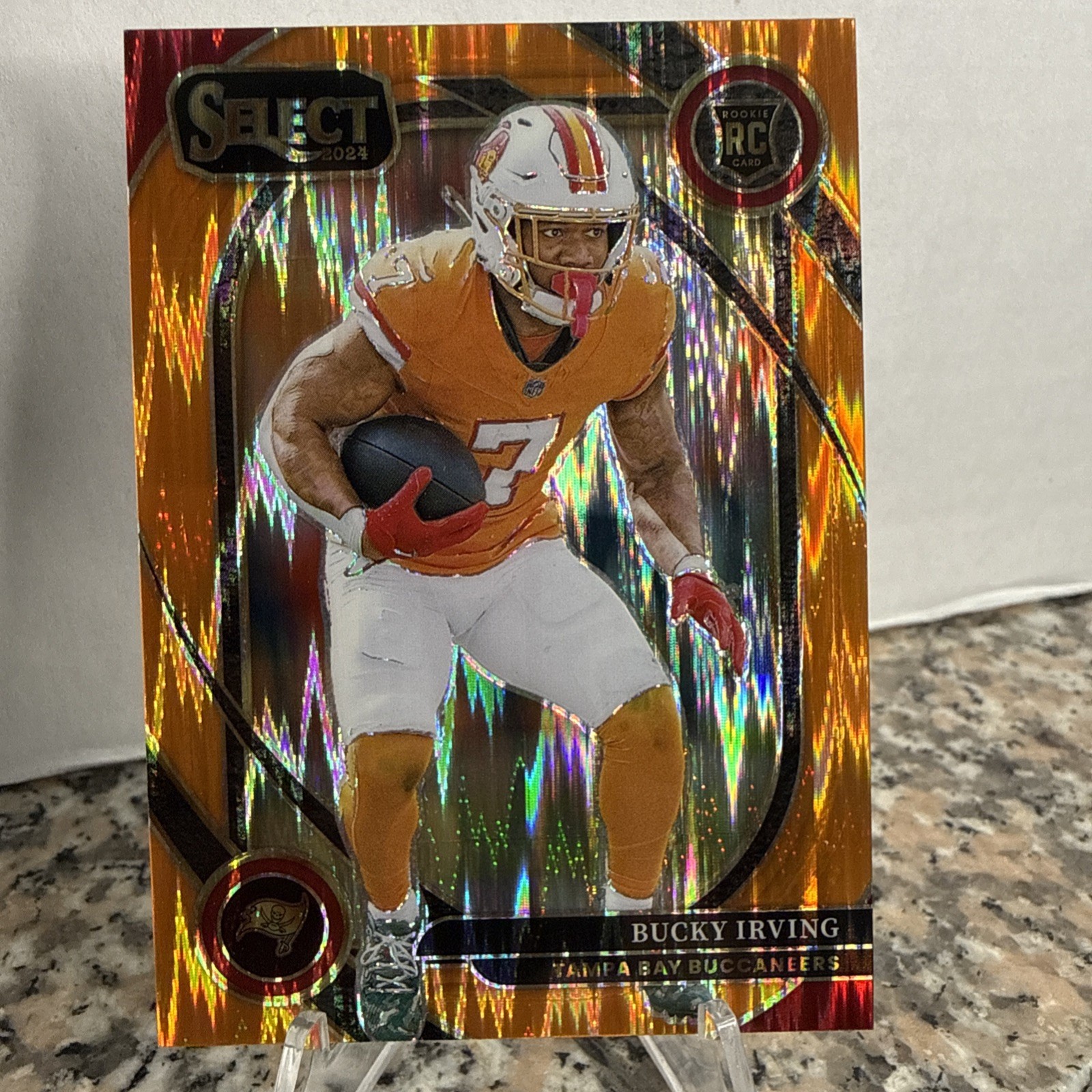 2024 Panini Select - Club Level Bucky Irving #239 Orange Shock Prizm /399 (RC)