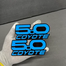 Light Blue COYOTE 5.0 Emblem Badges On Black Fender Angry Aggressive Racing
