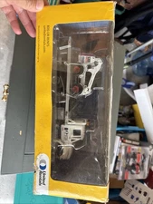 (New) 2009 First Gear United Rentals  Flatbed & Bobcat S300 Skid-Steer Loader