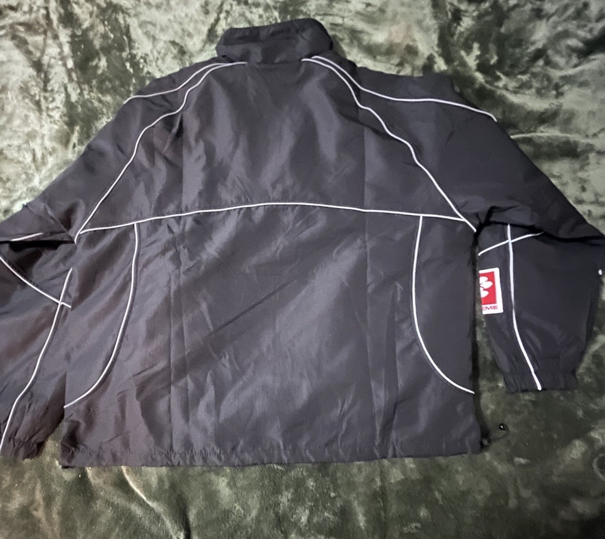 Supreme Men's Black Windbreaker Jacket with Logo Accents, Zip