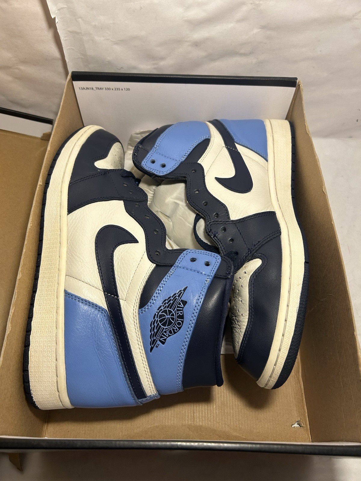 Talla 10 - Jordan 1 Retro OG High Obsidian UNC 2019