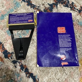 Nintendo NES Game Genie with Code Book!