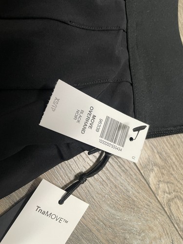 Microfalda de tenis plisada de tiro alto Aritzia TNA negra para mujer talla XS por encima de la mano - Imagen 4 de 4