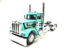 DCP / FIRST GEAR 1/64 SCALE 359 PETERBILT DAY CAB, TEAL WITH BLACK STRIPE