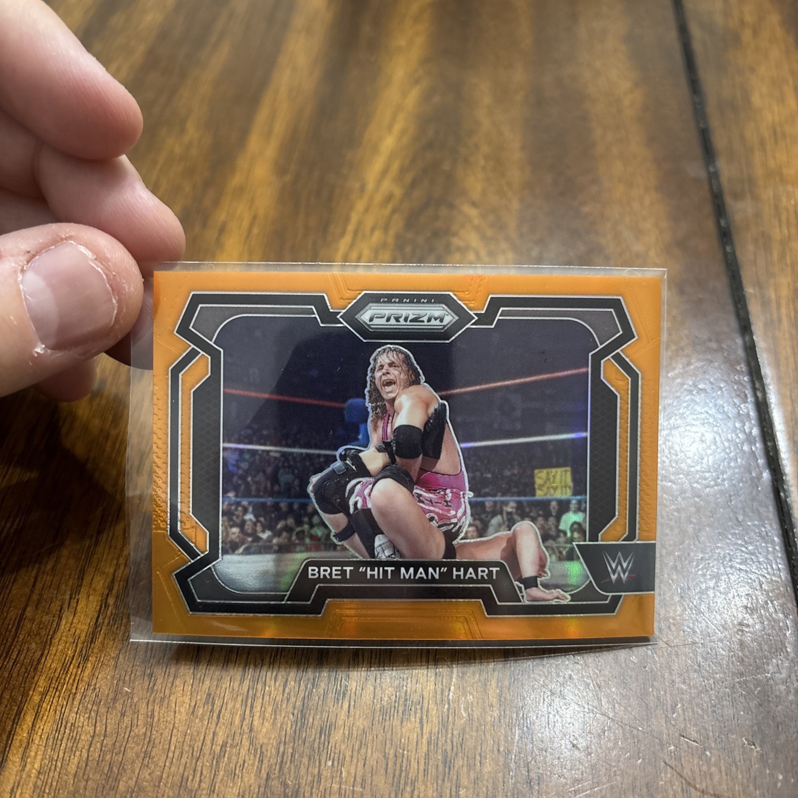 2024 Panini Prizm WWE Orange Prizm /99 Bret Hart Bret Hit Man Hart #26