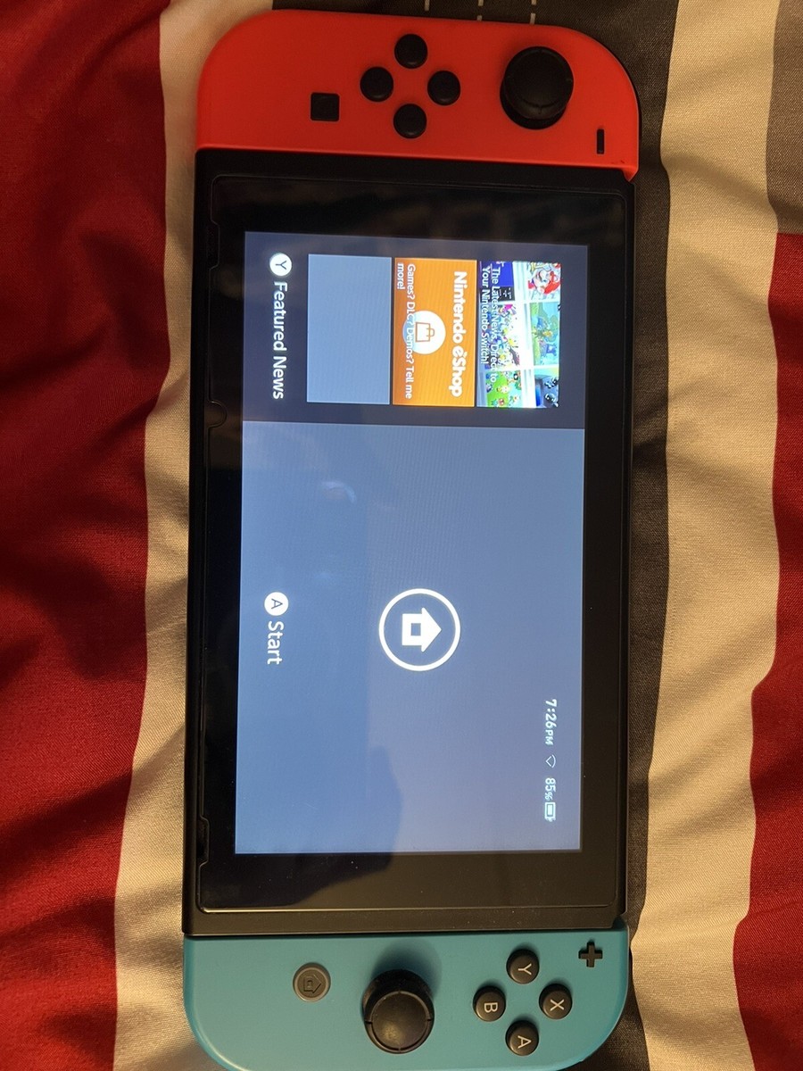 Launch Day Nintendo Switch 32GB with Neon Red and Neon Blue Joy
