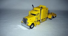 1/64th Cab DCP 548 379 Pete 63 Mid-Roof Sleeper Yellow With Show Parts