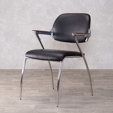 RETRO BLACK UPHOLSTERED CHAIR STAINLESS STEEL FRAME POLISHED ALUMINIUM CASTING