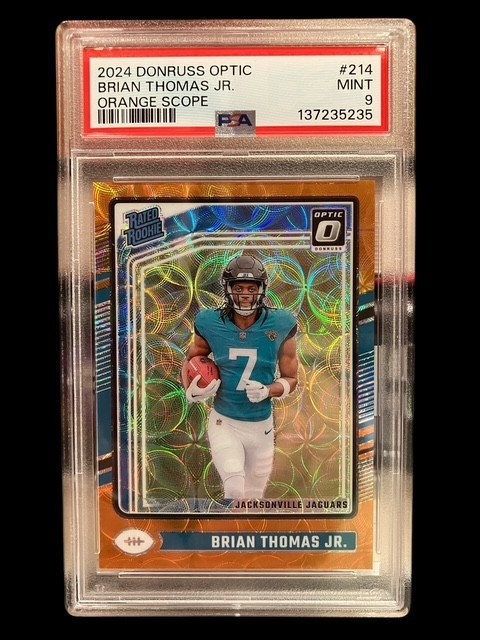 Brian Thomas Jr. 2024 Donruss Optic #214 ORANGE SCOPE HOLO /79 (RC) PSA 9 MINT