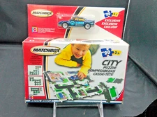 Matchbox City Puzzle with police car 2002 NIB