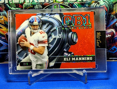 Eli Manning *2025 Wild Card Q.B.1 on the Clock*SSP*/2 Red Foil Board #OCW-RD-EM2