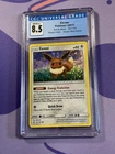 Pokemon TCG Sun & Moon Eevee 101/149 Sequin Holo CGC 8.5