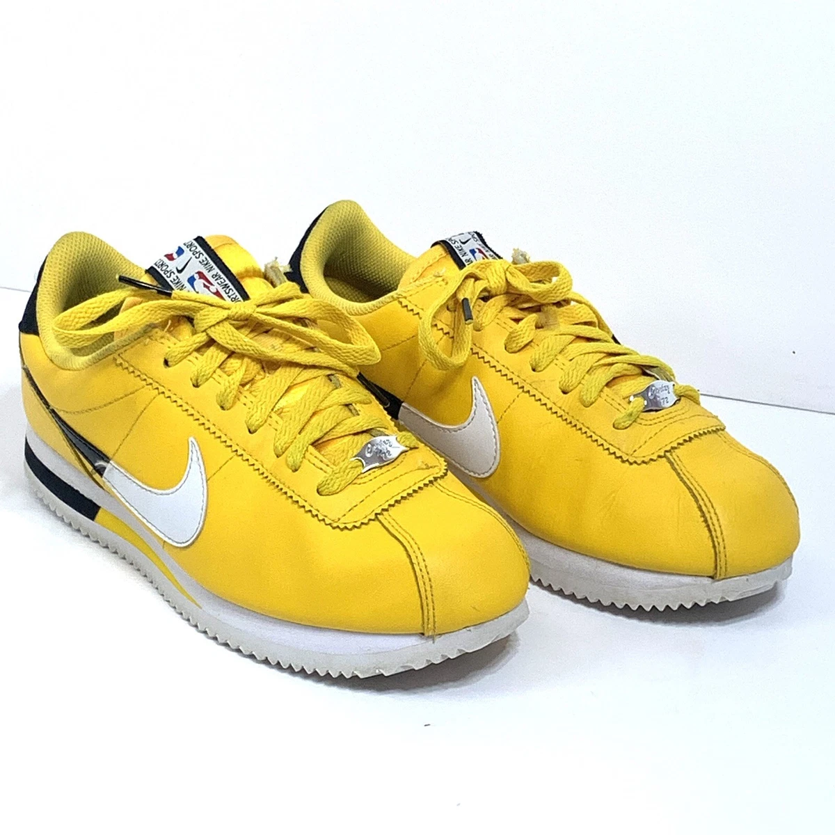 Black and top yellow nikes womens