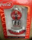 vintage Coca-Cola anniversary clock with coke bottle revolving pedulum