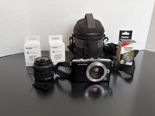 Olympus Pen Mini E-PM1 12.3MP With Lens 2 Bat...