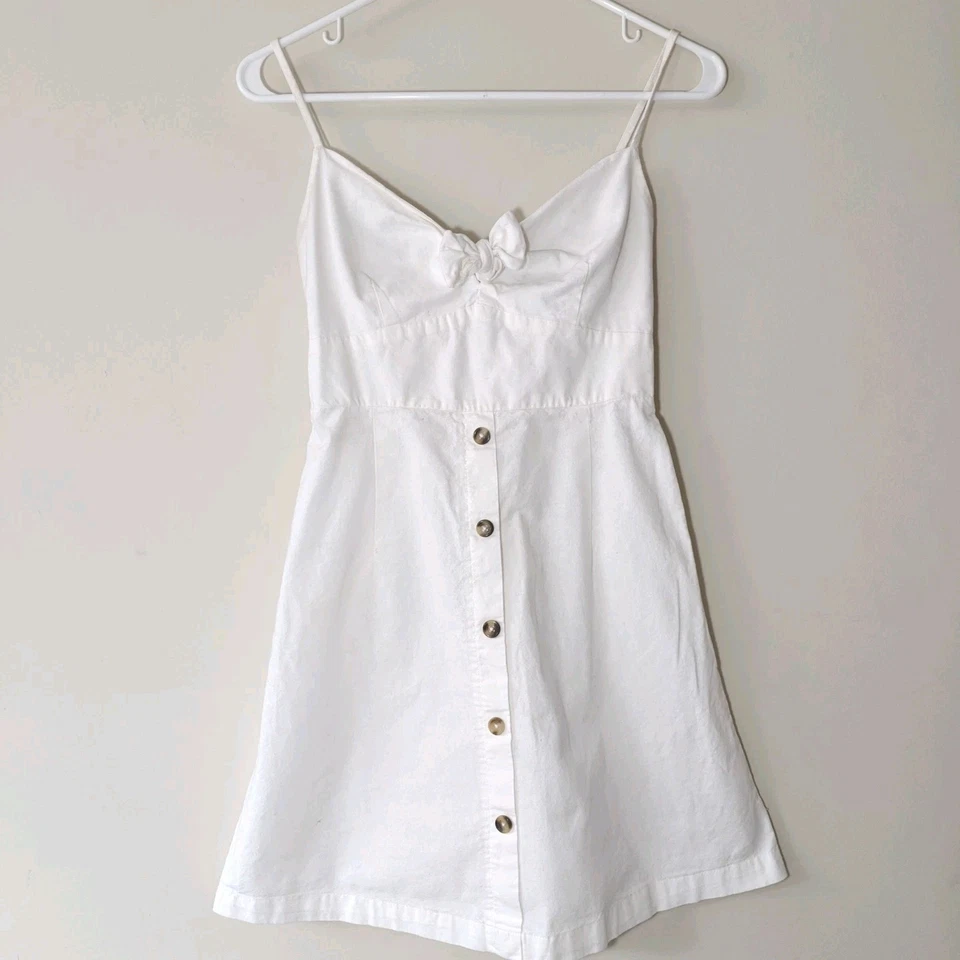 Mini Vestido Derek Corazón Talla Pequeña Blanco Tirantes Calce Y Acampanado 100% Algodón Botón Foto 2 de 4