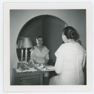 Vintage Photo Voyer Woman Getting Ready Mirror Reflection Vanity Hair Bun 1950s