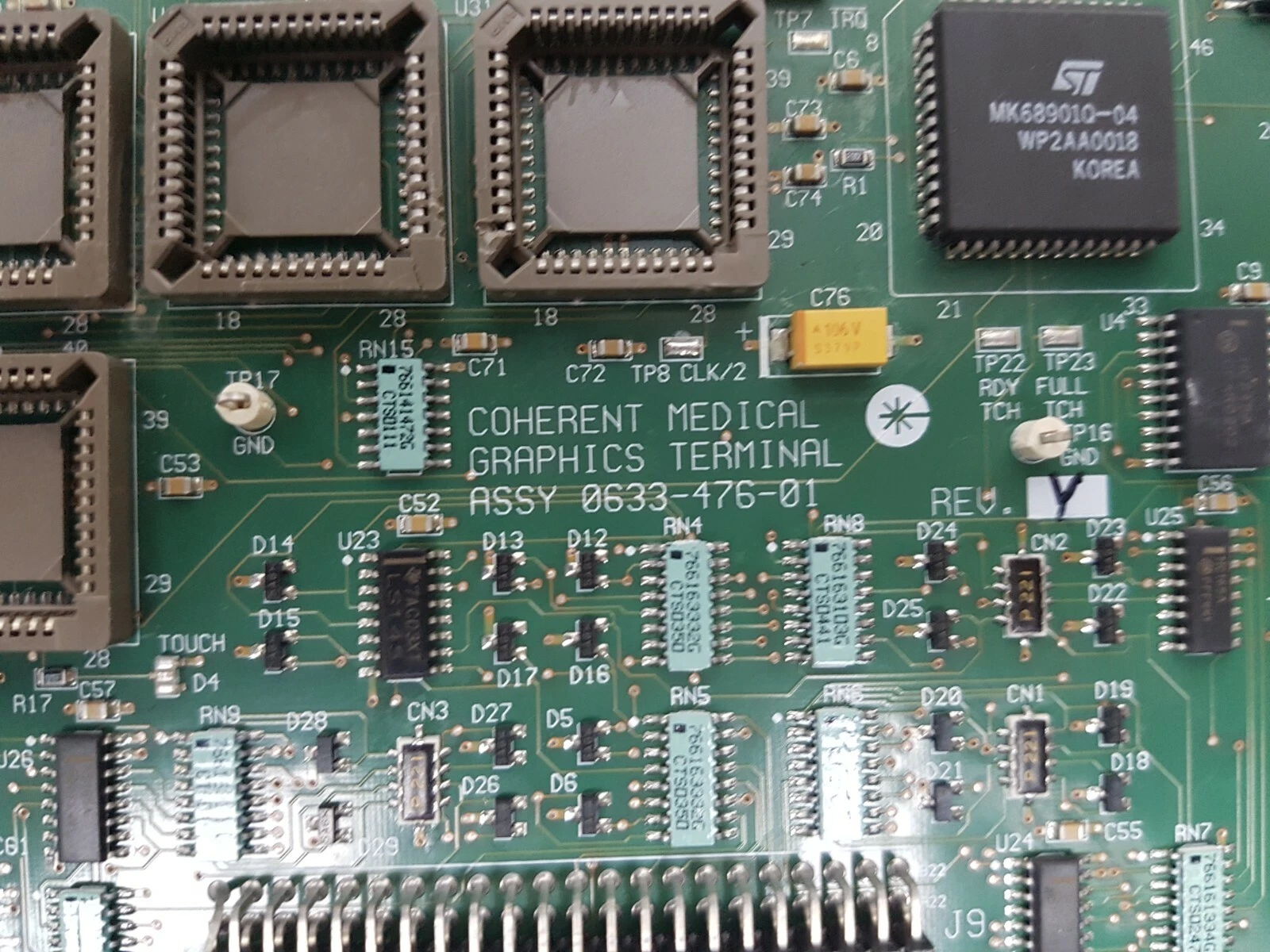 Silkscreen COHERENT MEDICAL GRAPHICS TERMINAL ASSY 0633-476-01 REV Y next to empty sockets and MK68901 chip