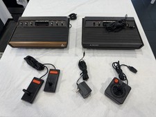 2 Atari 2600 Consoles - 1 Power Supply - Joys...