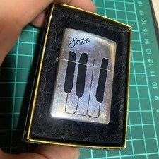 Zippo Piano Keyboard Jazz Oil Lighter Used