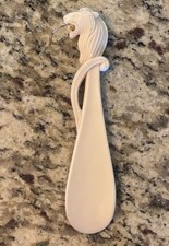 Vintage White Lion Head Plastic 7 1/2" Shoe Horn