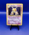 Alakazam 1/102 Base Set Holo Rare Pokemon Card 1999 WOTC TCG Vintage Pokémon
