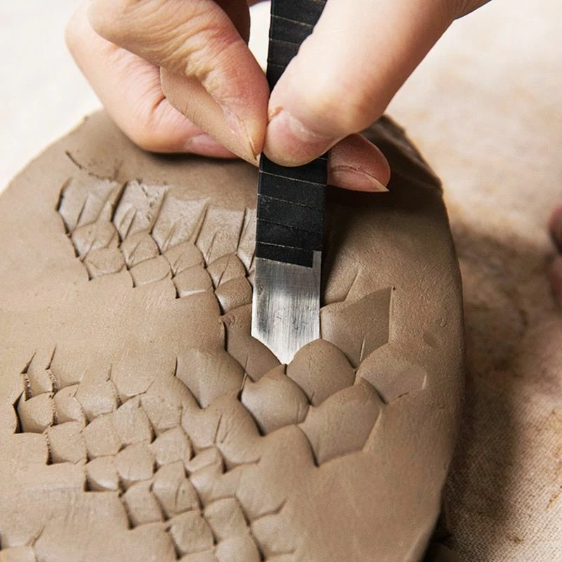 Carving outlet fish scales