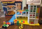 Vintage Fisher-Price Little People Garage Playset with Figures and Vehicles