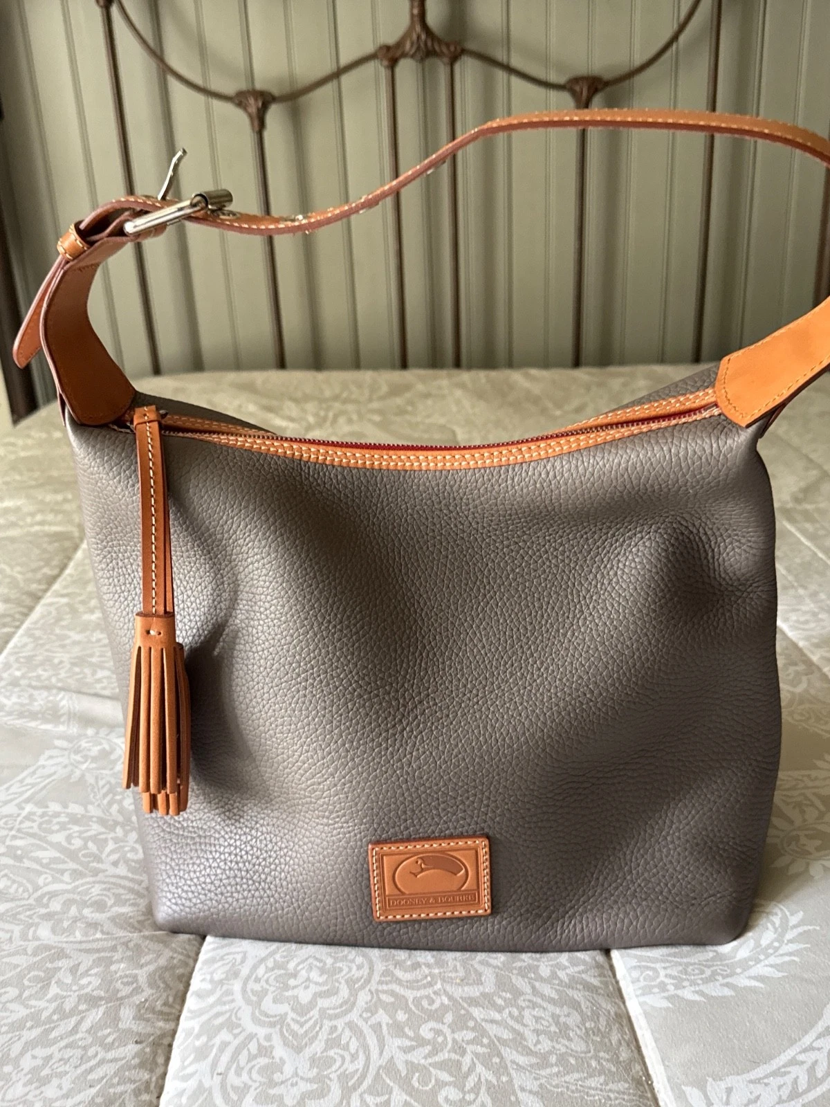 Dooney & Bourke Taupe tassel handbag NWOT