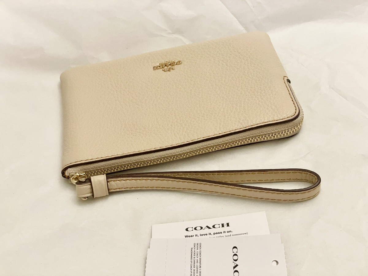 Coach X Peanuts Corner Zip Wristlet With Snoopy And Friends Motif