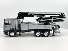 CONRAD Modelle I SCHWING-STETTER S 31 XT auf Mercedes Benz Actros (1:50)