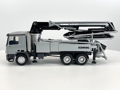 Conrad Models I Schwing-Stetter S 31 XT on Mercedes Benz Actros (1:50)