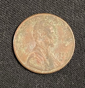 1999 Floating Roof Penny Odd M America Circulated Condition Lincoln Cent 