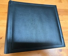 Hallmark book-bound photo album designed to hold 200 photos.