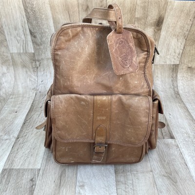 tumi brown leather backpack